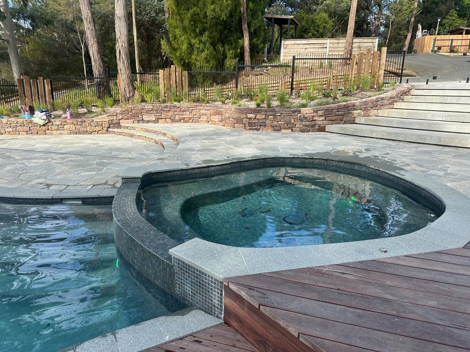 The outdoor pool at Oasis Camp