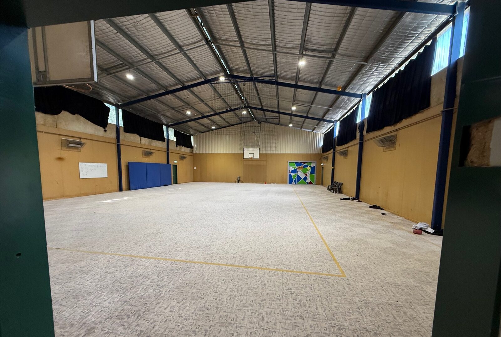 The gym and basketball court at Oasis Camp